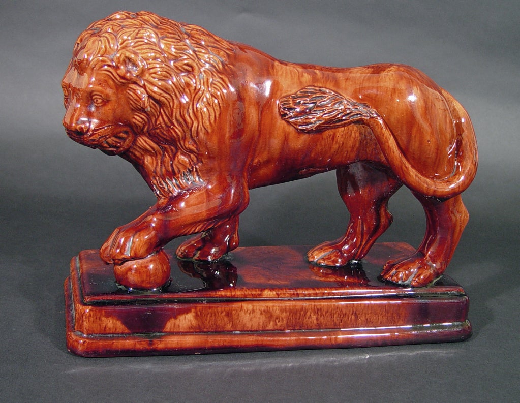 American A Pair of Large Rockingham Pottery Lions
