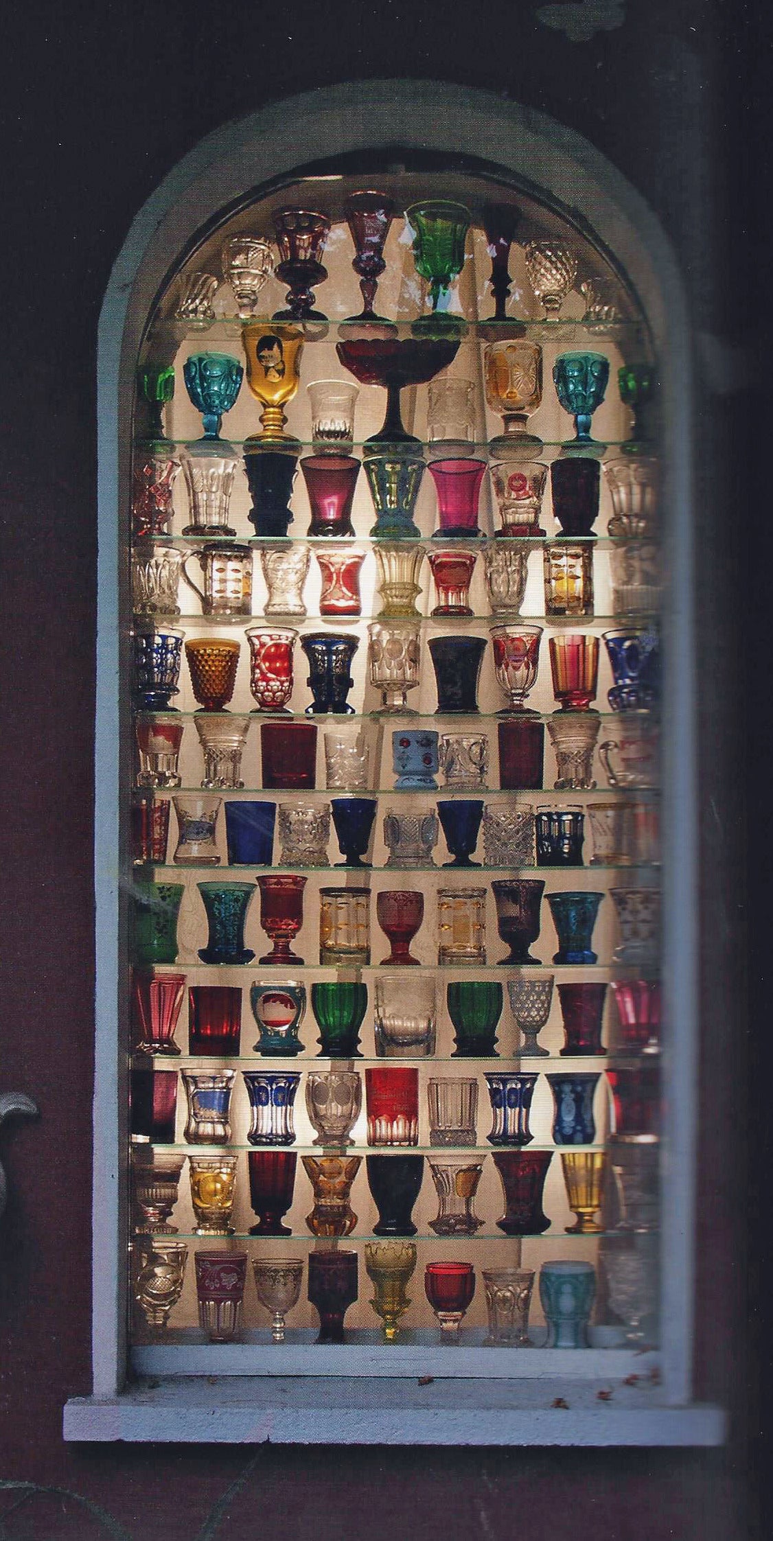 Piero Fornasetti's Bicchieri di Boemia pattern- Bohemian glass pattern found on this lovely metal tray is decorated with different polychrome antique Bohemian drinking glasses. Below see a photograph of a group of Bohemian glasses in Piero