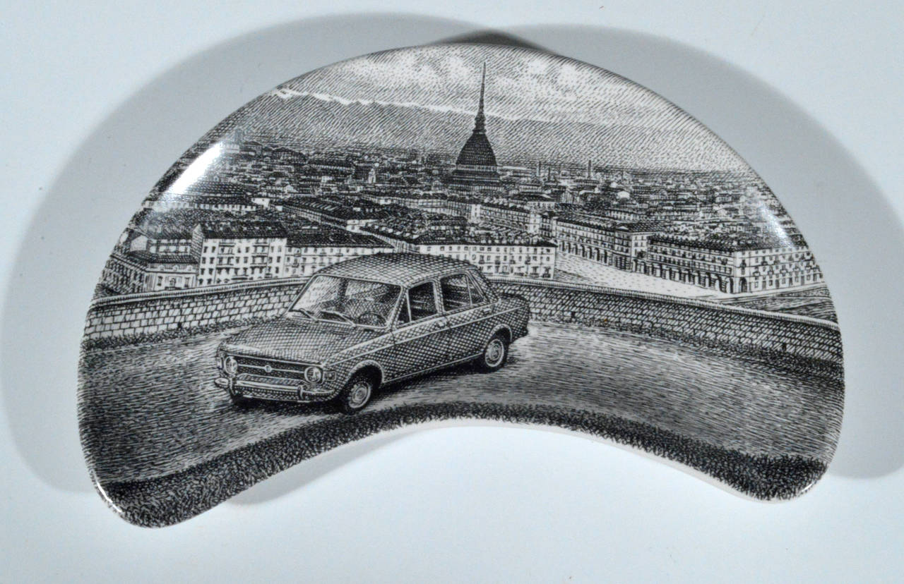 Piero Fornasetti's 1960s promotional plates for the Fiat Car Company are numbered 1-6, and are named series specialmente per la Fiat Torino.

The demilune black and white plates were made for the Fiat Motor Company as promotional pieces- part of a