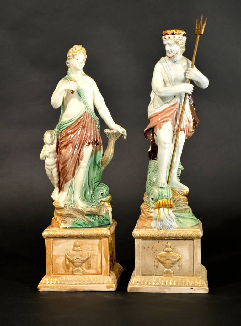Ralph Wood, Burslem, Staffordshire. The press-moulded lead-glazed earthenware figures depict Venus and Neptune each on a rectangular gilded plinth. The decoration is painted in colored glazes.
Reference: The Henry Weldon Collection: English Pottery