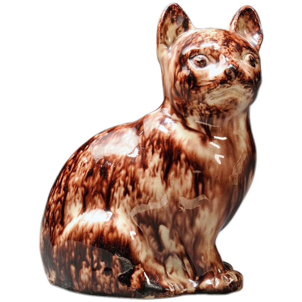 A Staffordshire Tortoise-shell Creamware Model of a Cat