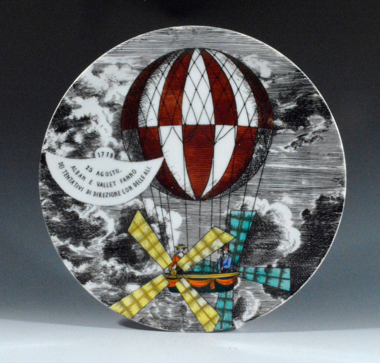 The large plates each depict a large hot air balloon with a panel describing the historical image. 

Each plate is numbered on the reverse. This set includes the following:-
2, 4, 5, 6, 7 (2), 9, 10, & 12.

Reference:
The name of the pattern