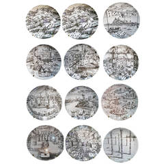 A  Set of Twelve Vintage Piero Fornasetti Plates in Citta di Carde Pattern.