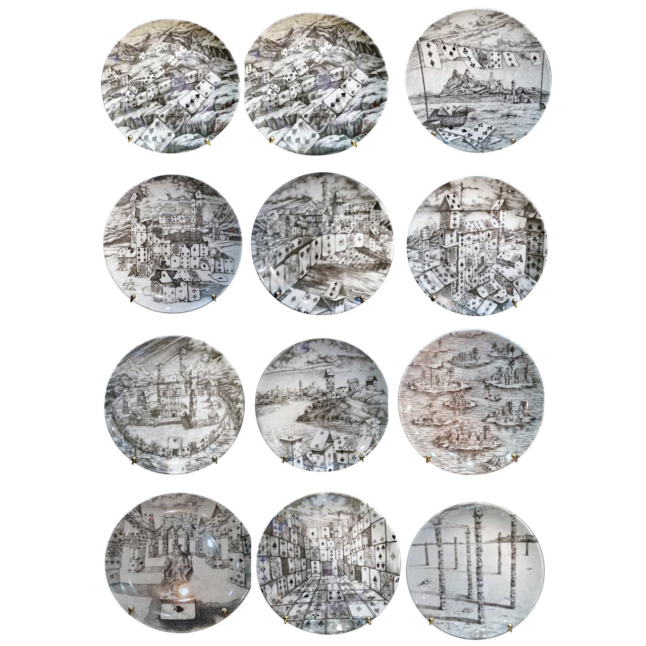 A  Set of Twelve Vintage Piero Fornasetti Plates in Citta di Carde Pattern.