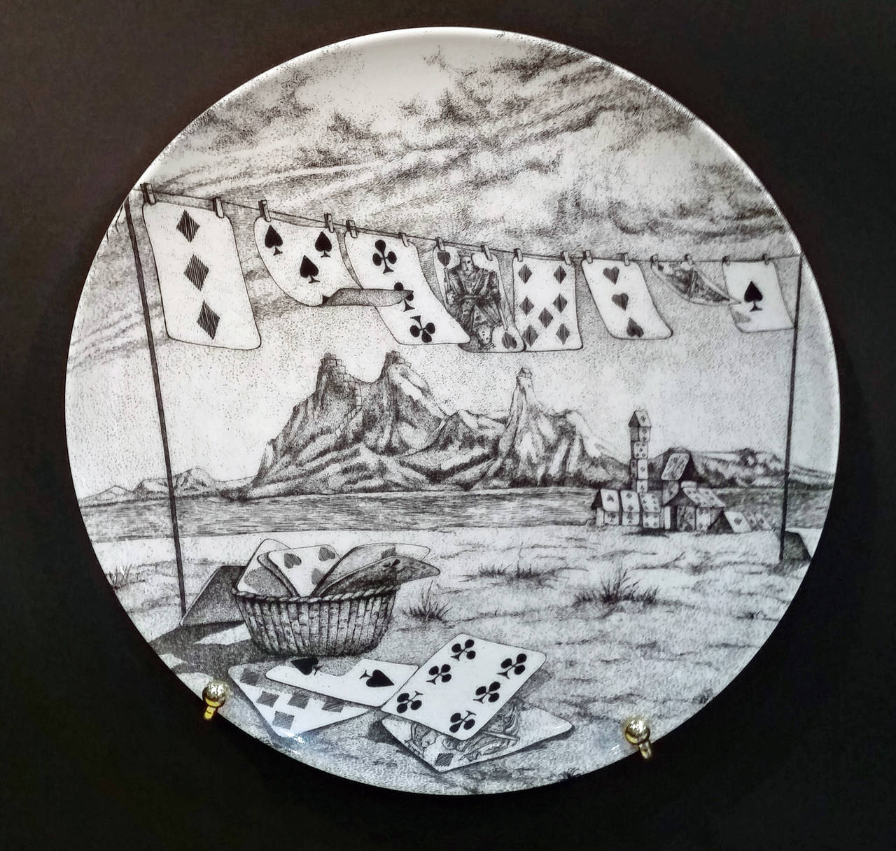 A  Set of Twelve Vintage Piero Fornasetti Plates in Citta di Carde Pattern.