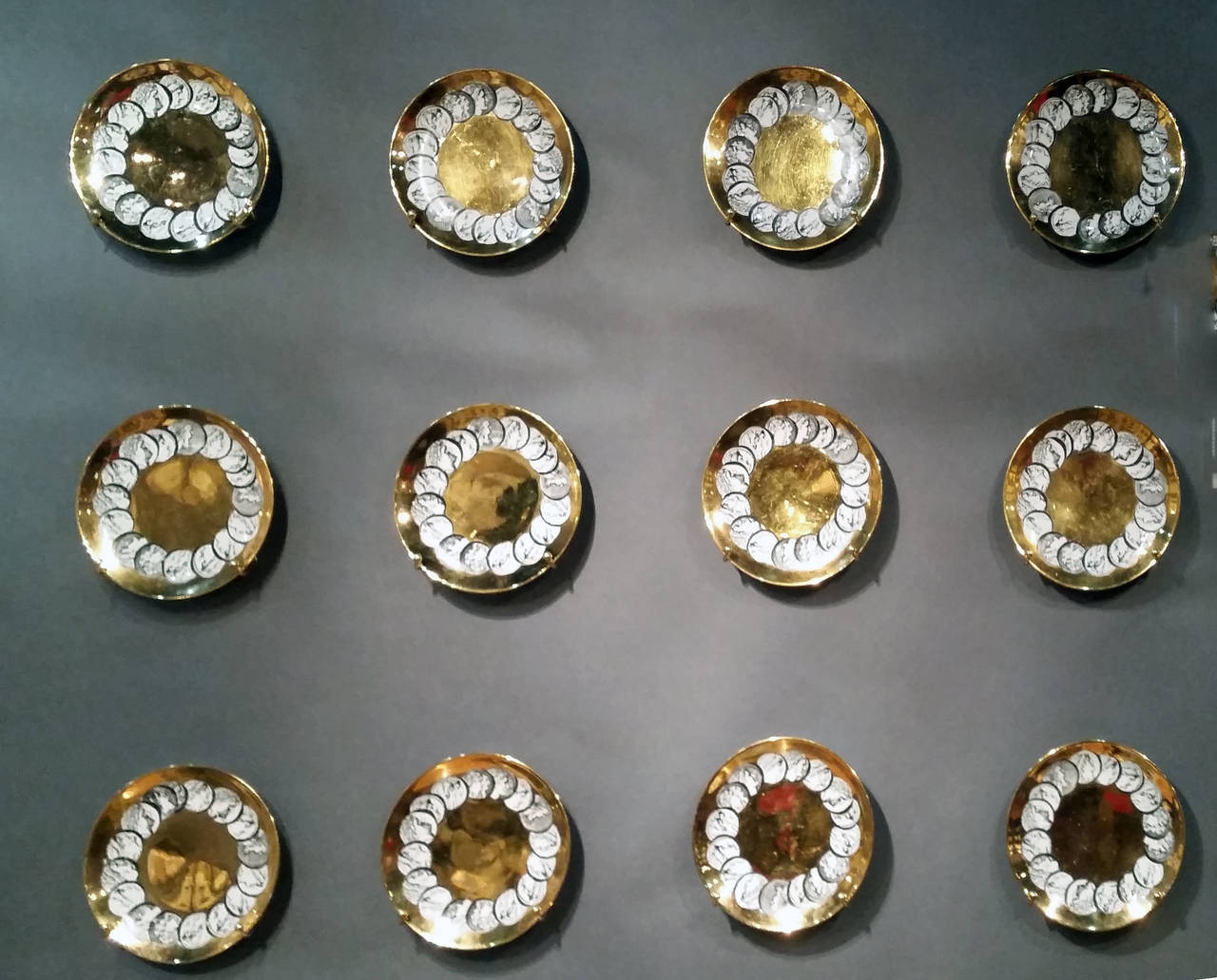 Rare Set of 12 Piero Fornasetti Gold-Ground Roman Coin Plates