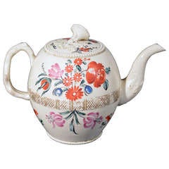 An English Creamware Botanical Teapot and Cover