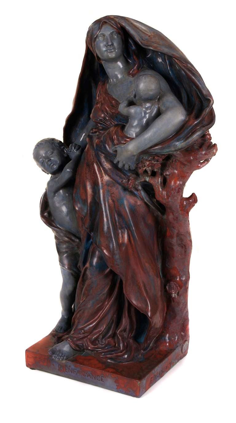 "Bienfaisance" (Charity), a ceramic sculpture designed by Eugene Delaplanche and executed in the workshop of E. Muller & Co., c. 1880's.

Delaplanche (1836-1891) was a French born sculptor recognized for his dignified naturalistic
