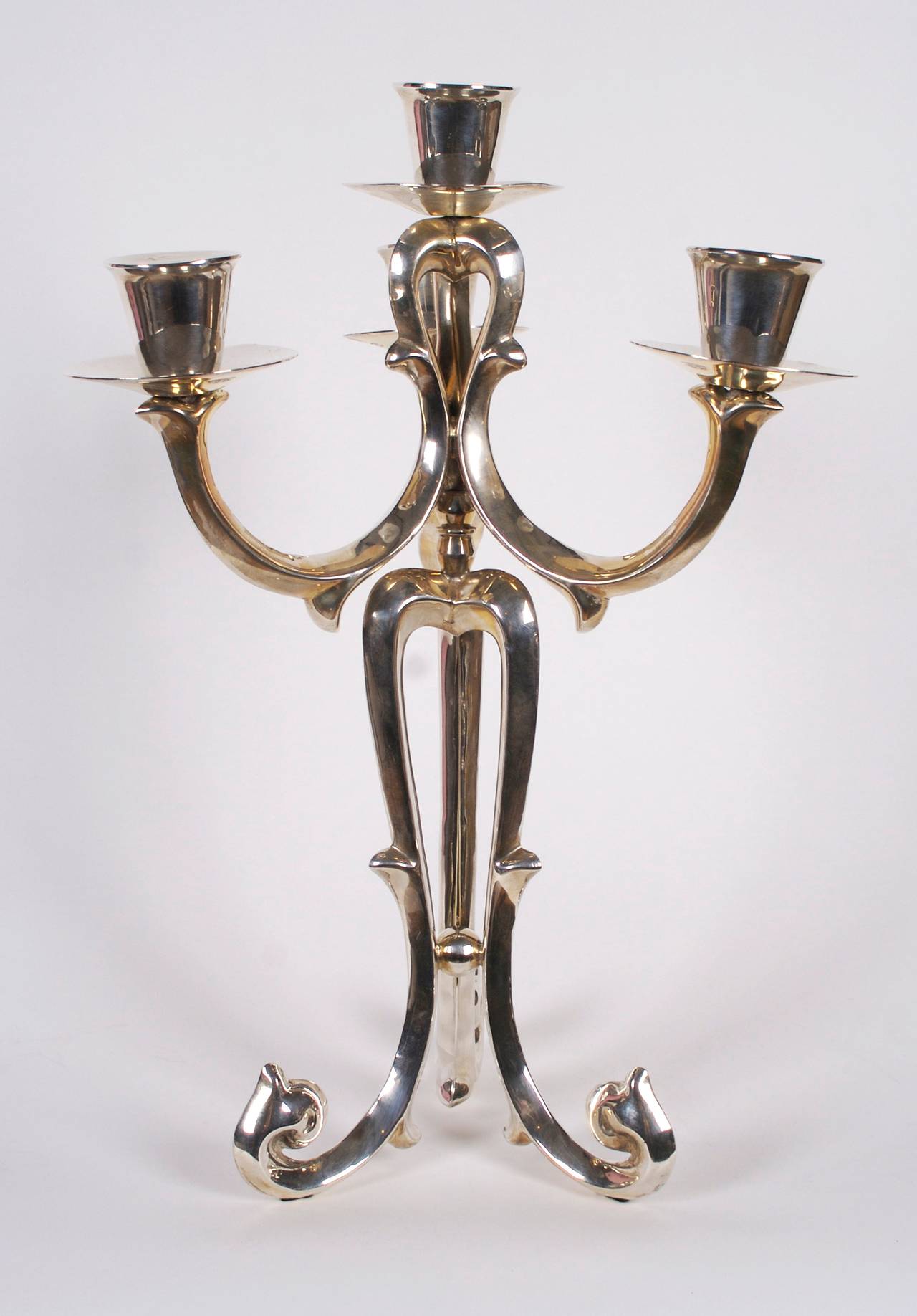 A pair of hand-wrought sterling silver candlesticks from Mexico, early 20th century. Each marked as indicated in photo, 