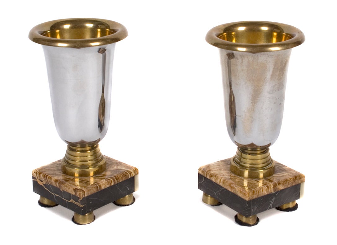 Pair of decorative shallow brass and silvered brass vessels with multi stone bases, circa 1940. Most likely French in origin, these were possibly elements of a mantel clock.