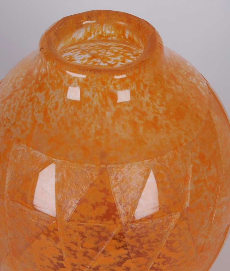 French art deco period vase by Degue' (David Gueron)/Cristalleries de Compiegne. Orange mottled glass decorated with bold bands of triangles; signed.