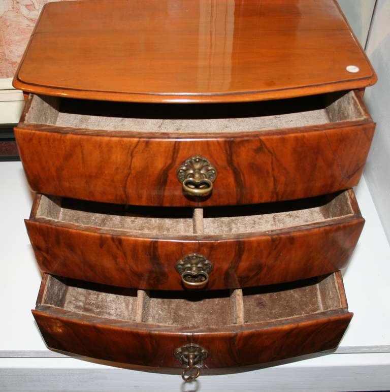 Austrian Biedermeier fruitwood jewelry chest from the early 1800s. Three drawers (two of them partitioned) lined in velvet.