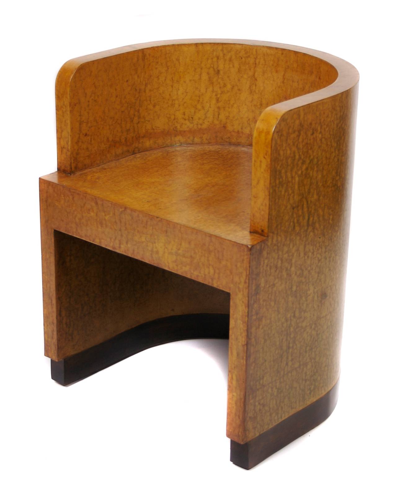 A striking pair of chairs by Giuseppe Pagano and Gino Levi Montalcini, 1929. Spruce structure covered with thin layer of plywood and a layer of boxwood veneer; these roll with wheels on ball metal casters. 

These, along with other pieces of