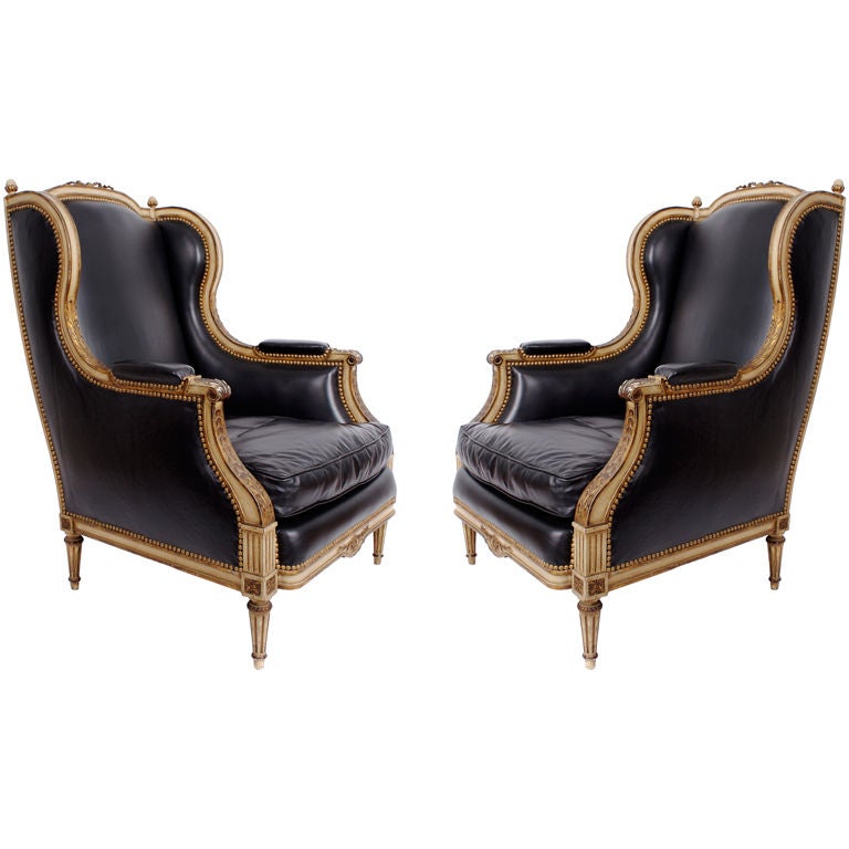 Pair of leather armchairs chairs in the style of Maison Jansen