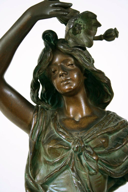 "Queen of Flowers," a bronze sculpture by Emile Bruchon, circa 1900; signed on left side of base. Bruchon was considered one of the greatest sculptors of the Belle Epoch period.