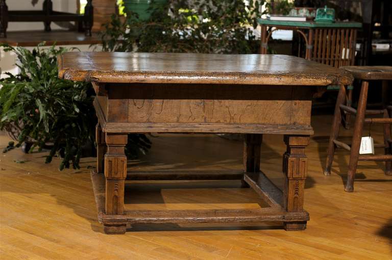 This wonderful Eastern European tavern table has been reduced in height to make a fabulous coffee table.  It has a top that slides so it is an excellent place to leave valuables.  It is very rare to find such a pretty table that can be reduced in