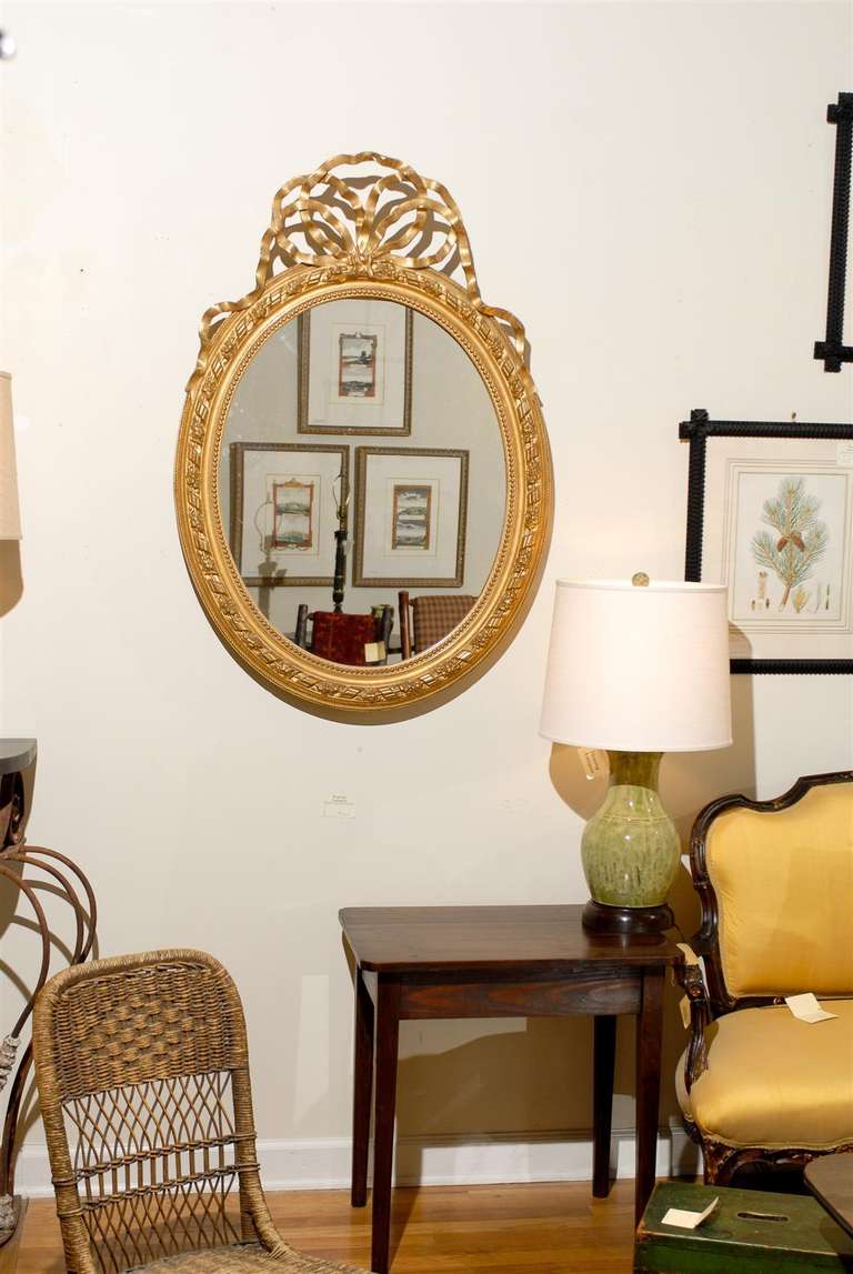 British Louis XVI Style Oval Gilt Mirror For Sale