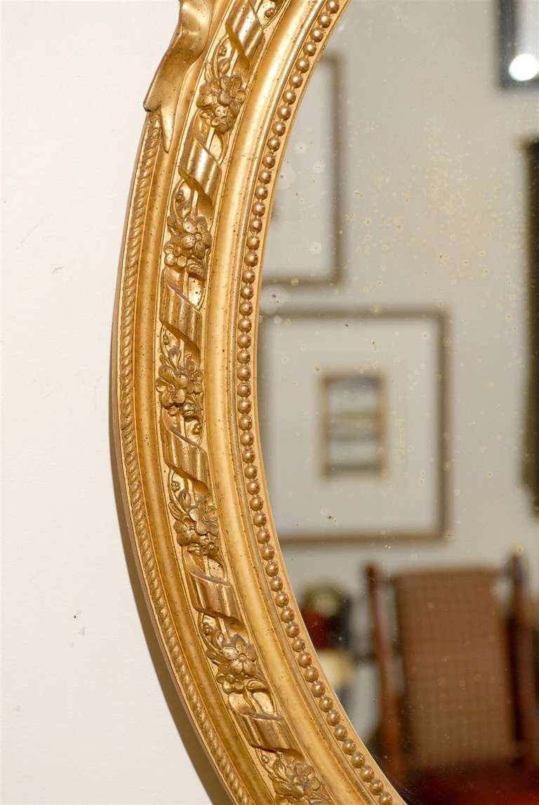 20th Century Louis XVI Style Oval Gilt Mirror For Sale