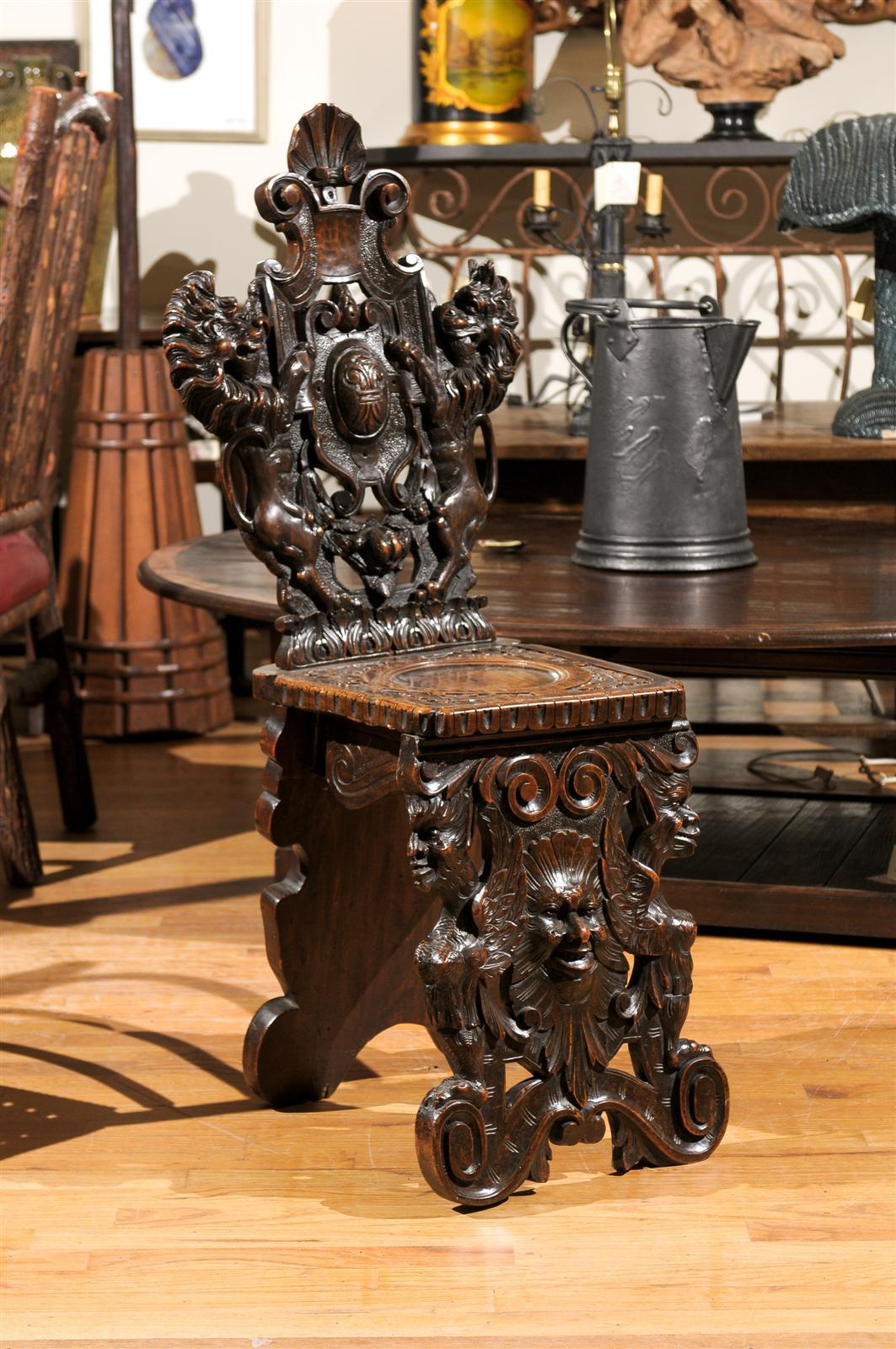 This is a 18th Century Jacobean chair made from solid wood.  It was hand carved by a joiner and has very intricate details on the front legs, back rest and seat top.