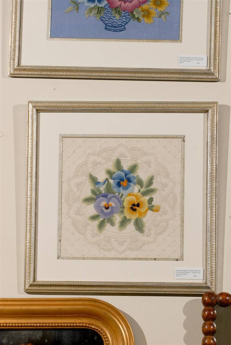 Available are two original crewel pieces. They are needlework pansies which have been framed with an antique white mat with silver leaf edging. The frame is a 1 in. Custom silver leaf combed frame. They may be purchased separately.

         