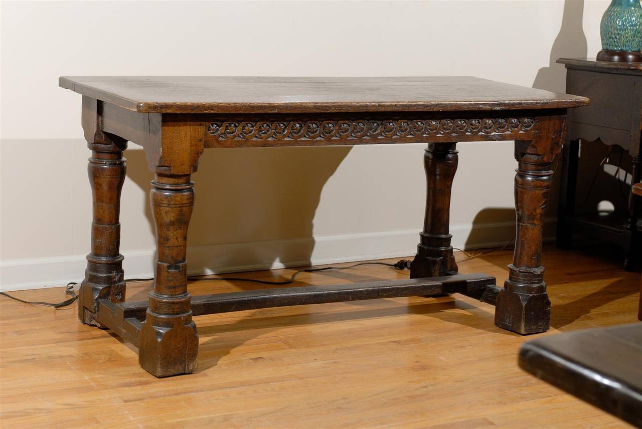 This is a wonderful example of an English refractory table.  The size is perfect for any home or office.  The table is in excellent condition.  Most of the Jacobean furniture was constructed out of oak and was very sturdy.