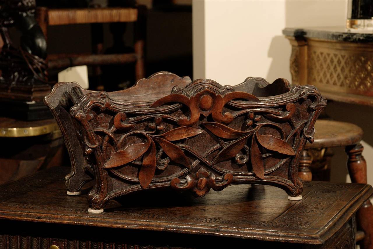 This is a fantastic planter.  It has a design of leaves and berries.  Black Forest items were originally carved by Swiss carvers in the 19th c.