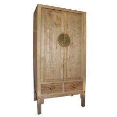 Tall rustic chest .