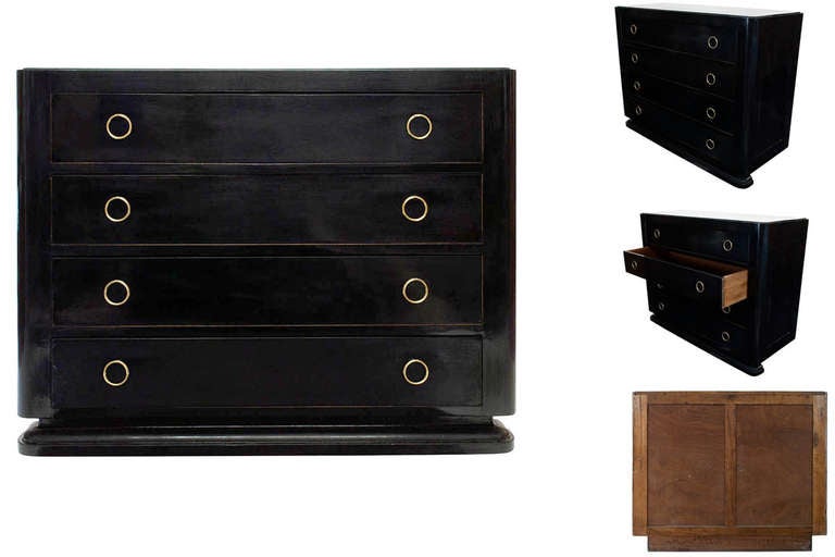 An Art Deco Black Lacquered Chest of Drawers with Four-Drawers and Featuring Circular Brass Pulls