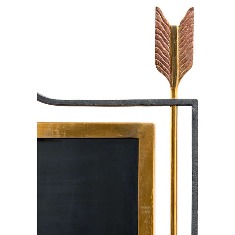A 1950's Gilt and Black Iron Mirror with Arrows and Palmettes at Center