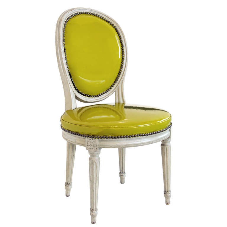 A Pair of Louis XVI Grey-Painted Oval Back Side Chairs Upholstered in Acid Green Patent Leather with Nailhead Trimming Surround