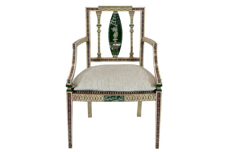 A Pair of 20th Century Continental Neoclassical Style Polychrome-Decorated Fauteuils with Figurative Imagery on Back Splat over Caned Seats above Painted Frieze on Tapered Block Feet
From the Branca Casa B Collection.