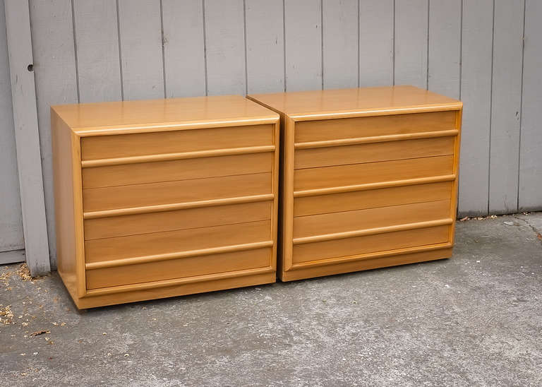 T. H. Robsjohn Gibbings for Widdicom pair of matching dressers. Three drawer dressers on original low profile fully functional castors. Retains Widdicomb label. Completely restored finish. Structurally sound drawers and their riders offer smooth