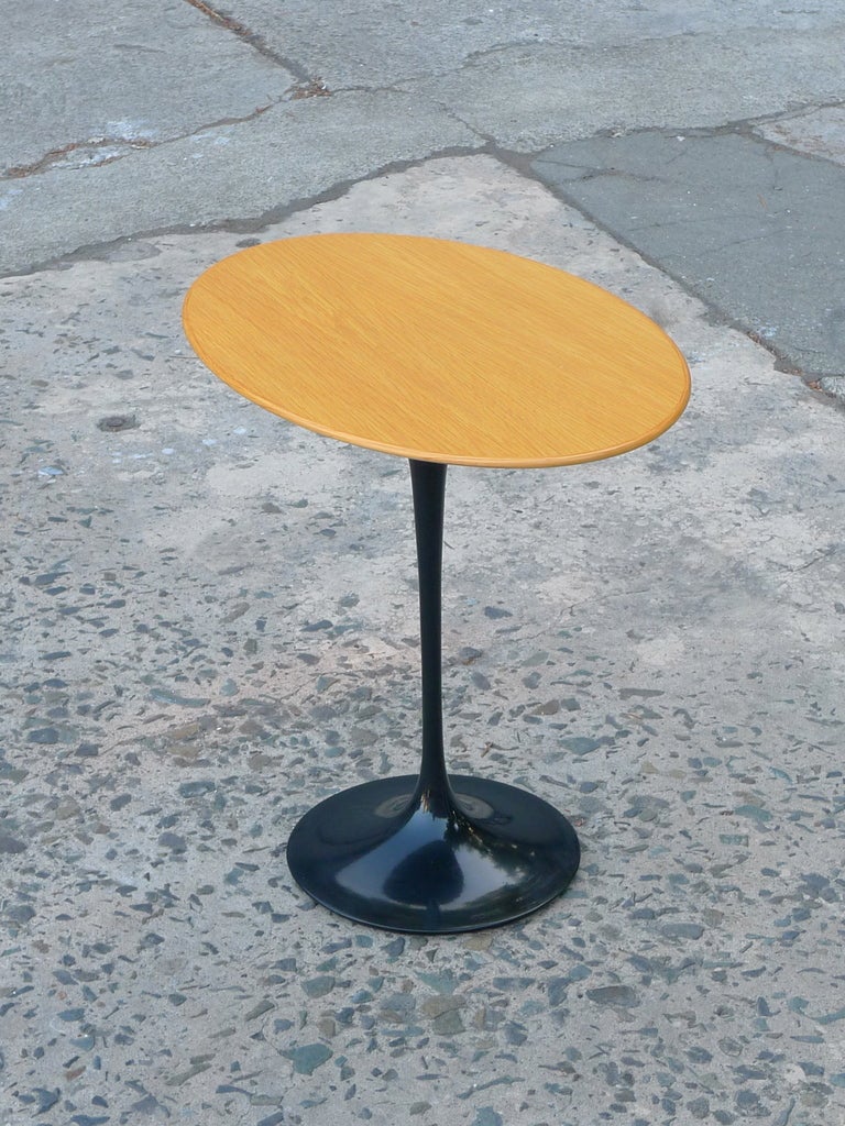 Current Knoll production example of Eero Saarinen Tulip Table originally designed for Knoll in 1956
Black Rilsan coated base, light oak top.
Cast aluminum base coated with black Rilsan finish.
Rilsan is a highly durable polymer coating.