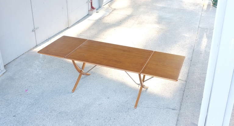 Hans Wegner classic dining table crafted by Andreas Tuck, circa 1951.
Brand to bottom of table indicates Wegner/Tuck Production.
Unusual all-oak variation.  
Fully restored wood surfaces have been re-lacquered and hand rubbed to a soft