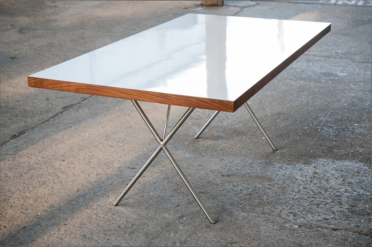 George Nelson 1950 X-base dining or writing table design for Herman Miller. 
This is not a vintage example. Nor is it a Herman Miller production. 
It was built using a prototype base fabricated some years back for proposed reproduction by