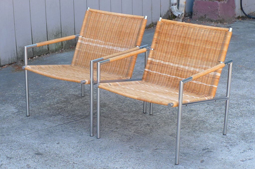 Martin Visser for Spectrum Vintage Midcentury Modern Pair of Arm Chairs
Handsome pair of club chairs designed in 1960 for Spectrum Meubelen in the Netherlands
Seat and back of Cane with Chrome base
Flawless welding and steel joinery with simple