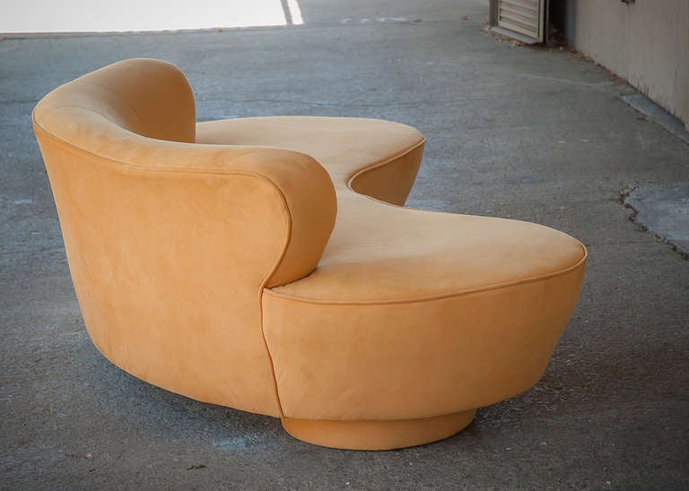 Curvaceous kidney shaped sofa by Vladimir Kagan for Directional, circa 1980.
Flowing lines and deep cushions offer decadent comfort and visual exuberance as only a Kagan design can... can...
Large circular pods upholstered in matching ochre team