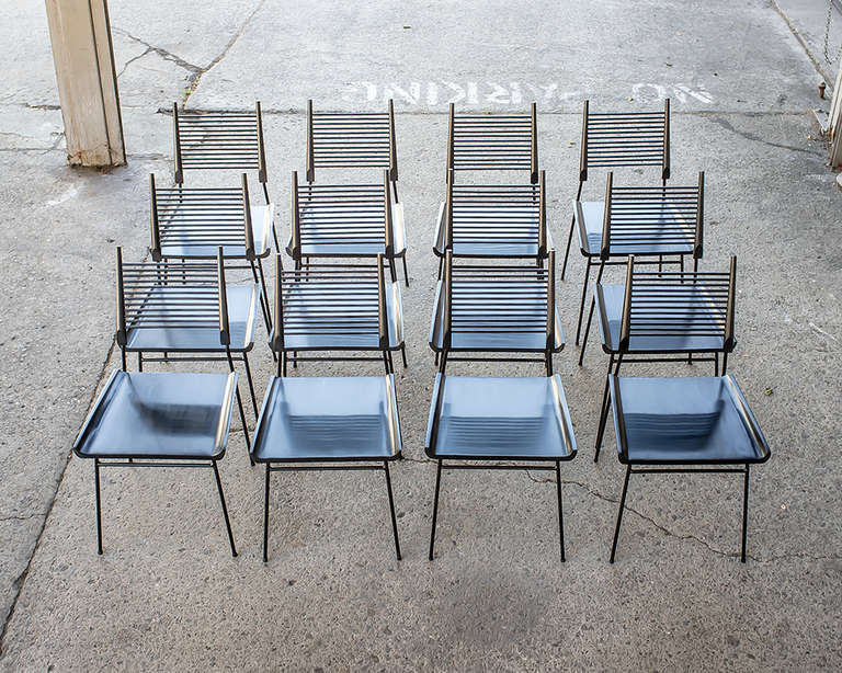 Sculptural Paul McCobb vintage ladder back chairs with sled seats.