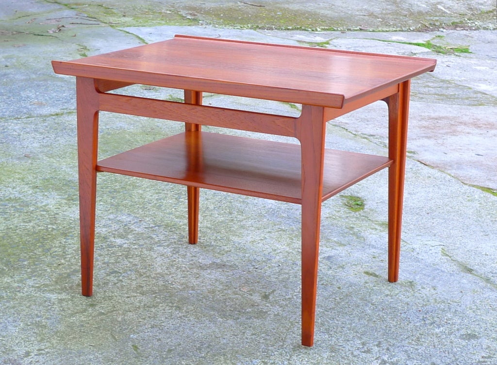 All teak vintage late fifties side table with 2nd level by Finn Juhl, cat. 533.  Made in Denmark; France & Son Medallion on bottom.  <br />
Less common small version of classic design with even more unusual second tier.<br />
Dimension Details: