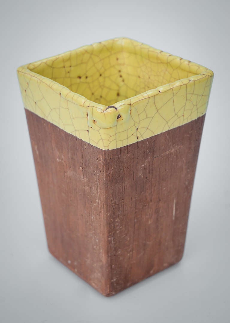 Barbara Willis early ceramic vase with yellow crackle glaze on sought-after architectural ceramic form-this a flaring rectangular box.  Artist signed in clay on base.
Excellent example of Willis earlier signature style with Glen Lukens inspired