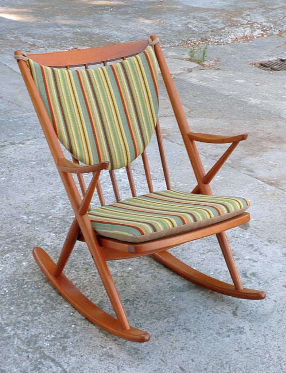 Teak frame rocker with wool cushions by Frank Reenskaug for Bramin, 1958.
Comfortable and well balanced Scandinavian rocking chair with new navajo candy striped seat and back of highest quality Scandinavian wool fabric with hi-tech perforated latex