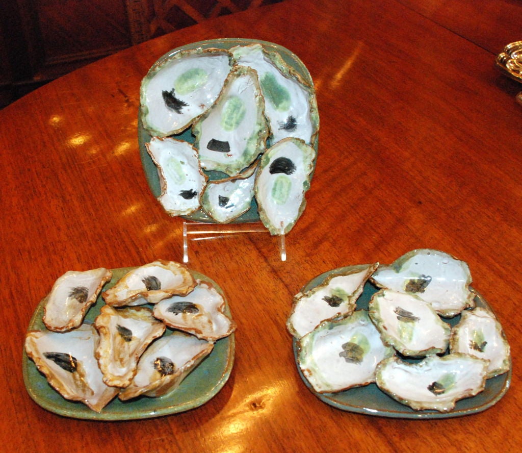 Handmade stoneware oyster plate made by local New Orleans artist they are food safe/ oven safe/microwave safe/and dishwater safe. They are all very unique due to hand painting and shaping. They are perfect for that oysters Rockefeller or oyster