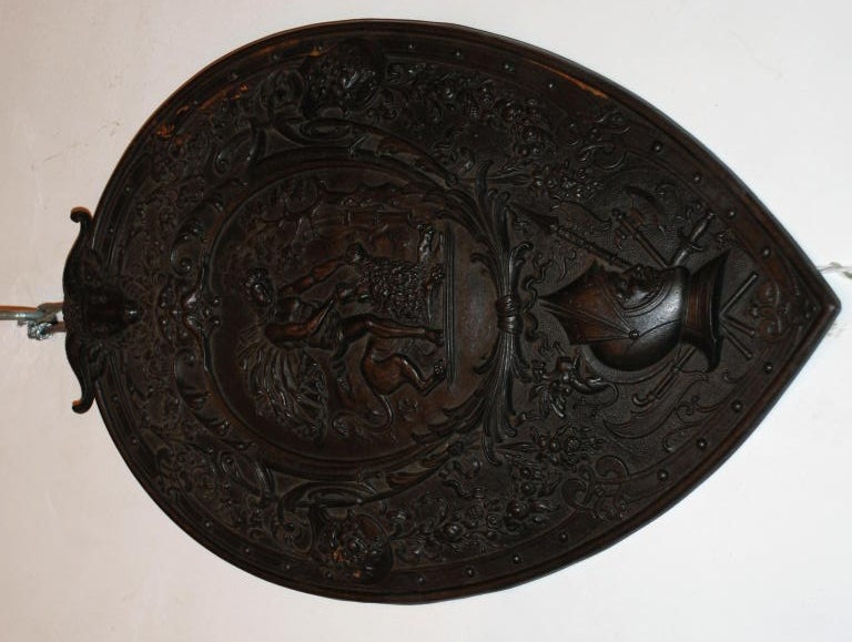 Antique bronze shield depicting the 