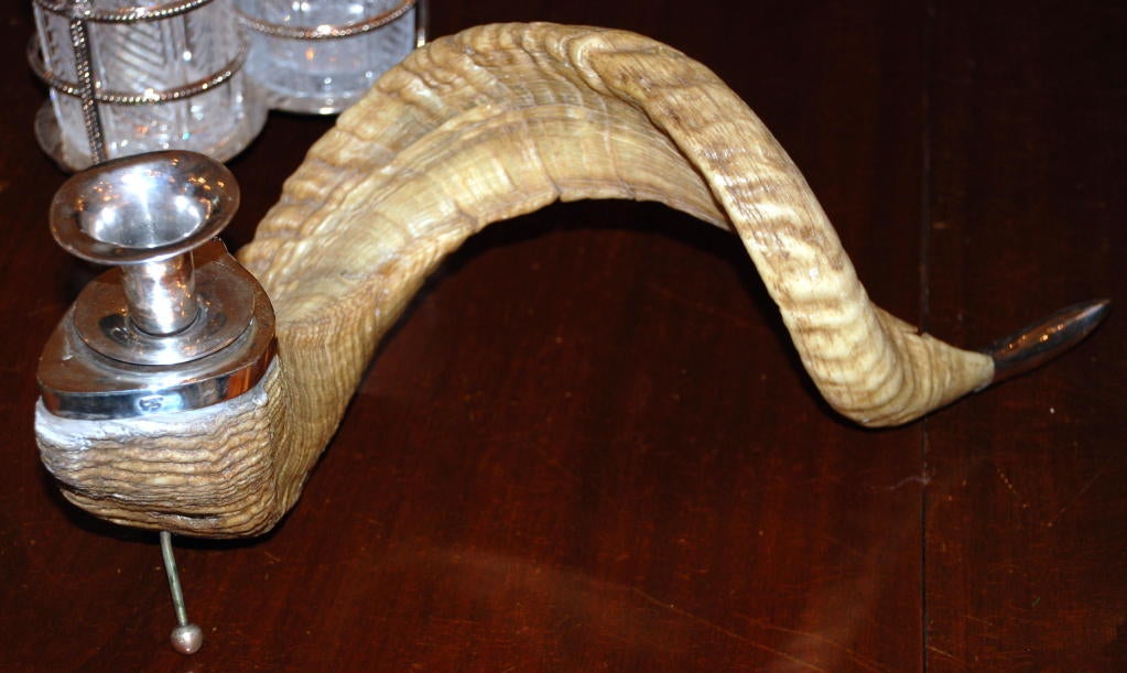 Antique Ram horn candle holder with sterling silver mounts.