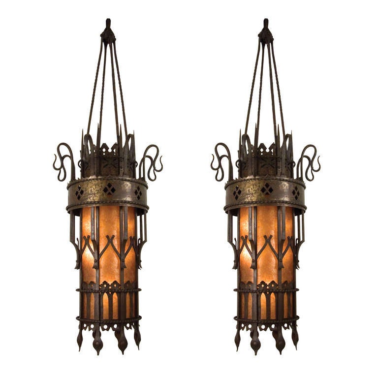 Originally found in a long island craftsman style home, this handsome hanging lantern is made of cast iron with a mica shade. It has a minimum drop of 97” and can have chain added to it to suit your specific needs.

$13,500 each.
$25,000 for pair.