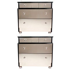 Pair of Black-painted and Stainless Steel Chests with Bun Feet