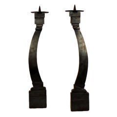A Pair of Cast Bronze Candle Holders