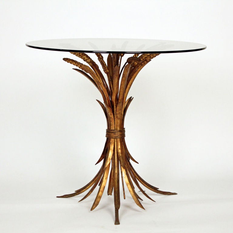 Gilt Metal 'Wheatsheaf' Side Table<br />
Bronze-coloured Glass Top<br />
49.5cm diameter x 45.5cm h<br />
875 Inc. VAT