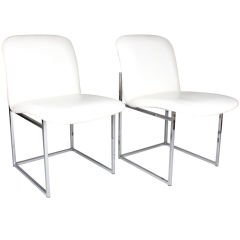 A Pair of White Upholstered Chairs in the Style of Milo Baughman