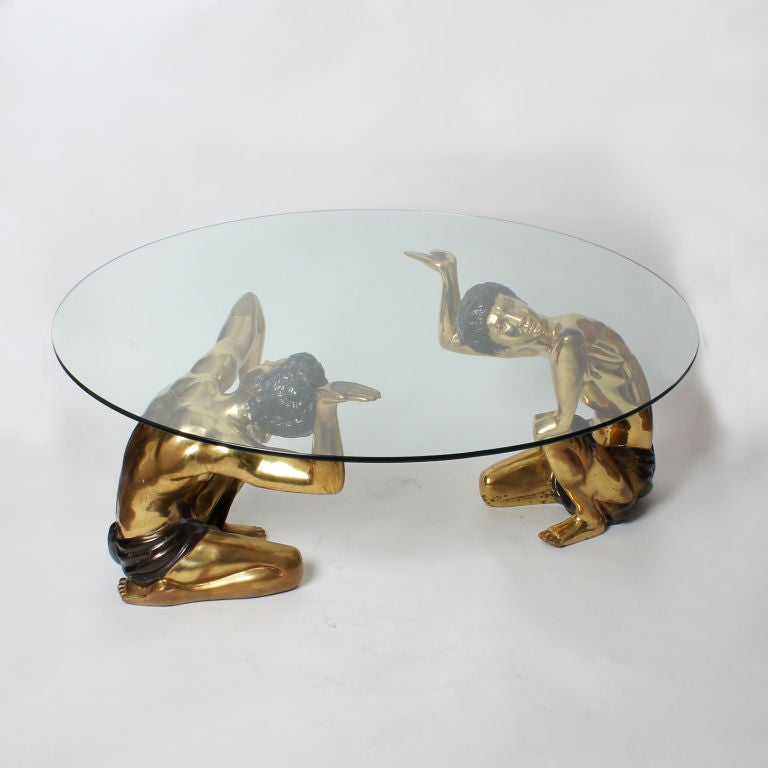 Vintage Glass Topped Coffee Table Supported by Crouching Brass Nubians
